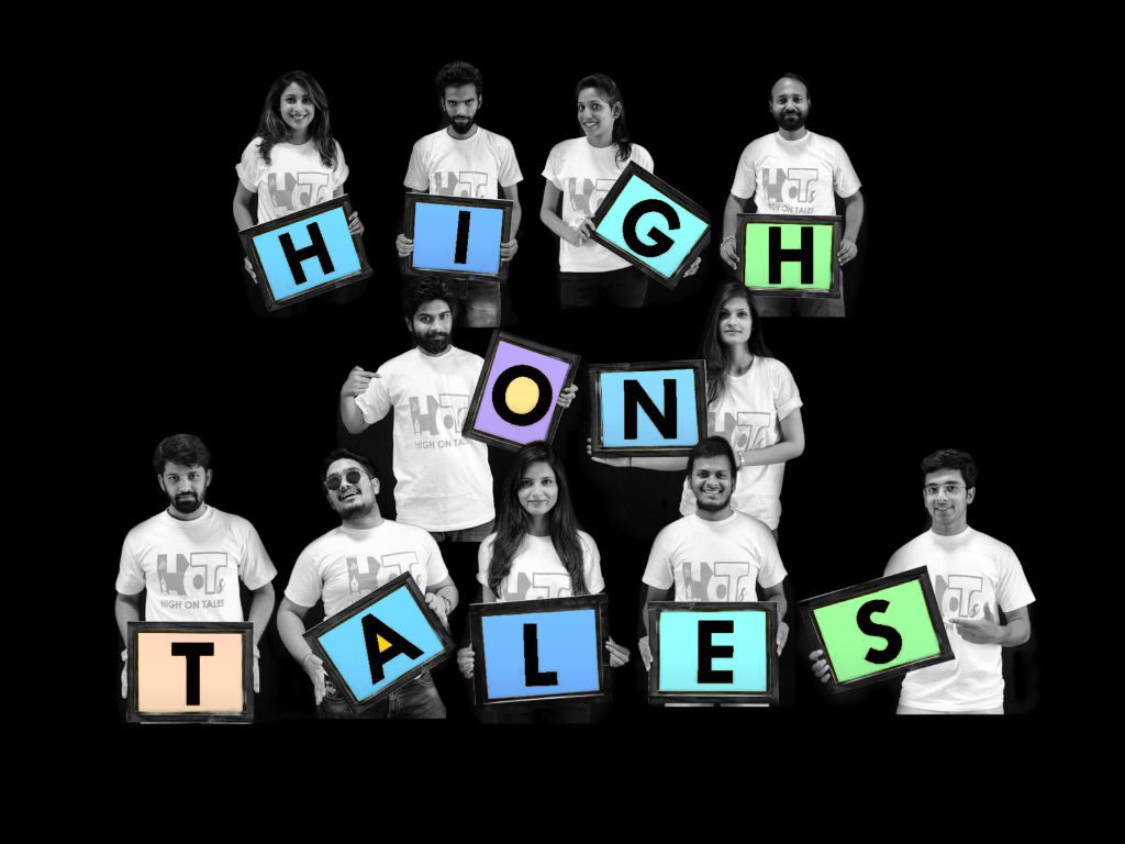 The High on Tales team spelling out the brand name